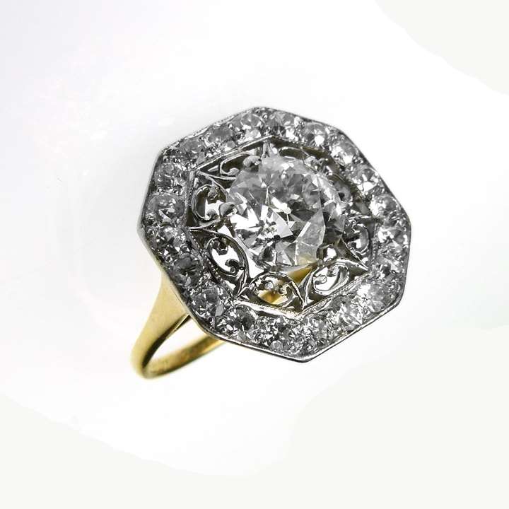 Early 20th century diamond set octagonal cluster ring, centred by a round brilliant cut 1.53ct I VS2 diamond